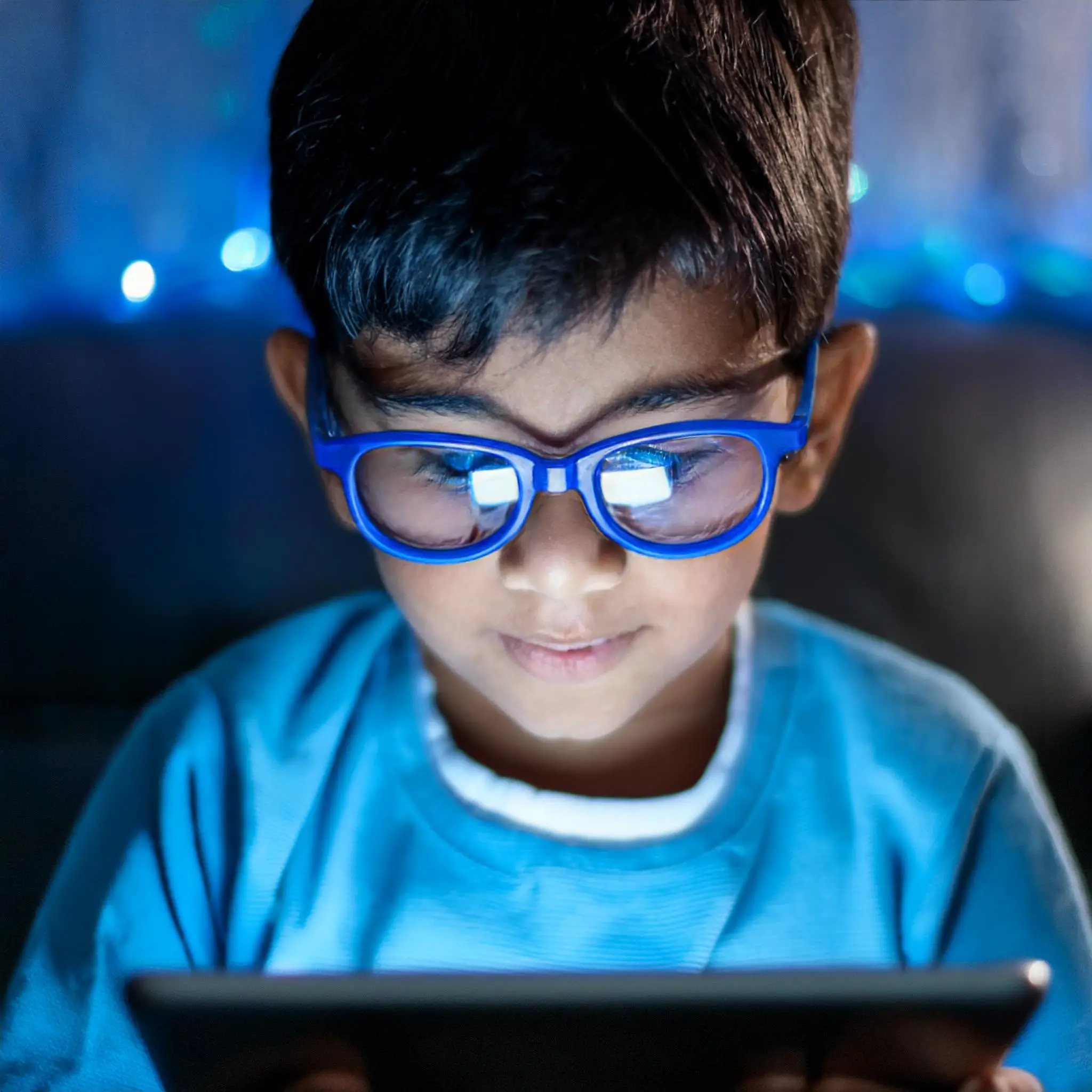 Firefly A close up of a child wearing blue light glasses while watching a tablet with soft ambient Computer Glasses