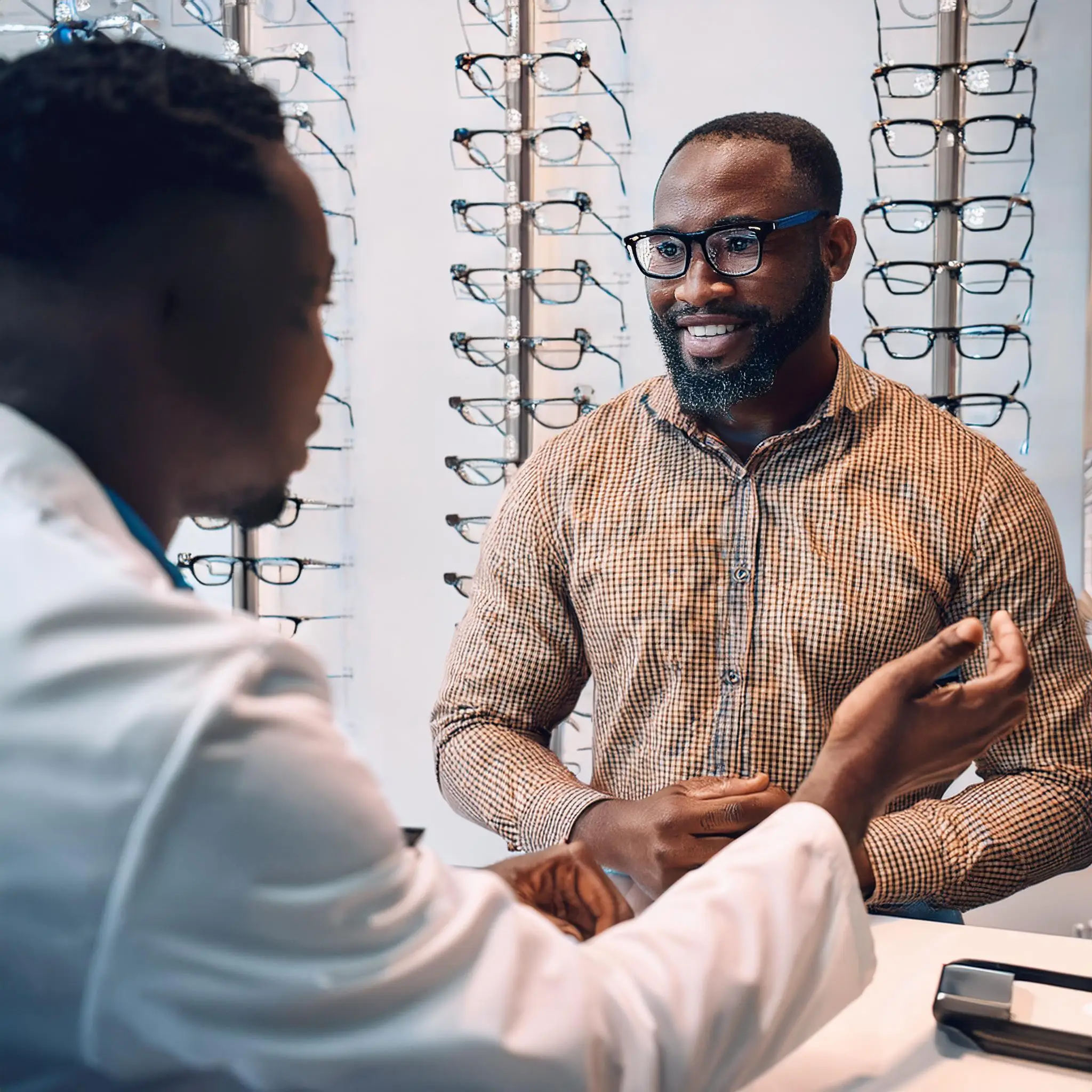 Firefly the optician advises the customer 5332 Reading Glasses in Waterloo